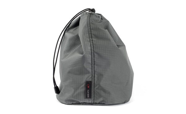 A Size 4 Mountain Grey (grey with light grey grid) 210 Cerylon Travel Stuff Sack.